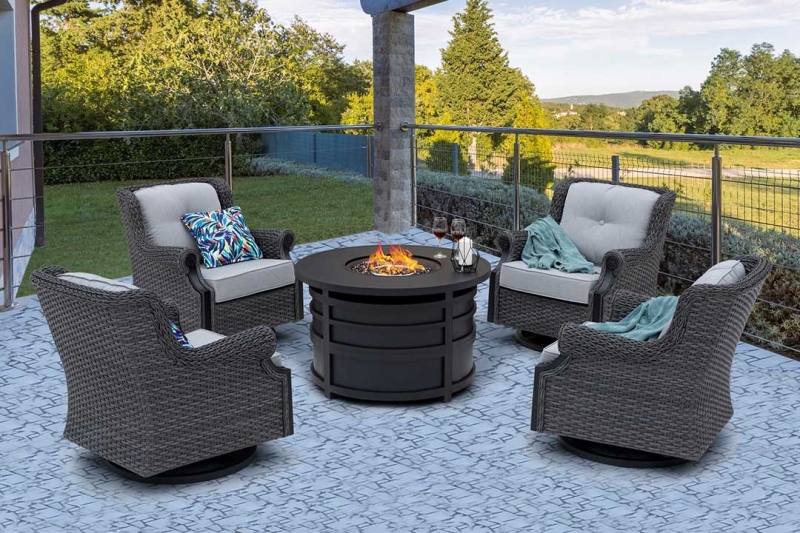 The Lassen 5-Piece Aluminum Wicker Firepit Set combines four swivel rocking sofas and one round firepit table. The soft cushioning and supportive upholstery offer a seat with lasting comfort.