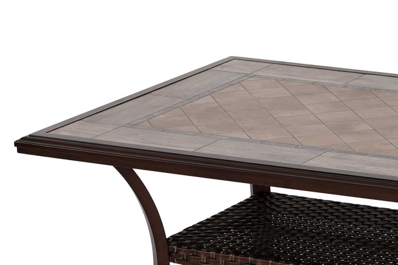 An elegant and sophisticated dining table with a tile top and (intricate) metal leg detail. A stylish choice for your patio spaces.